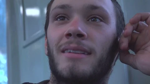 Boy Talking with Passenger in a Train Stock Footage 69738120