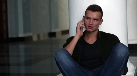 Boy is talking on the phone 2 Stockbeeldmateriaal 54267325