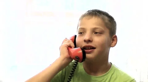 Boy talking on the phone Stock Footage 67852878
