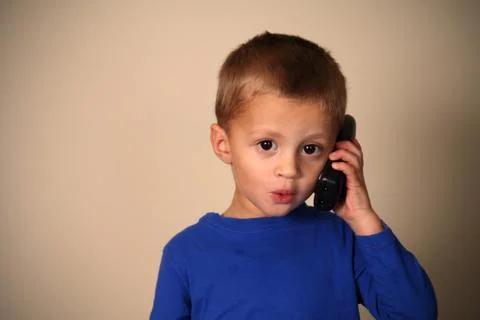 Boy talking on the phone Stock-Fotos
