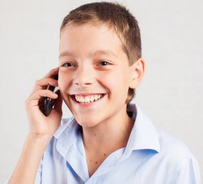 Boy talking phone Stock Photos