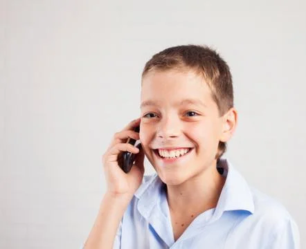 Boy talking phone Stock Photos