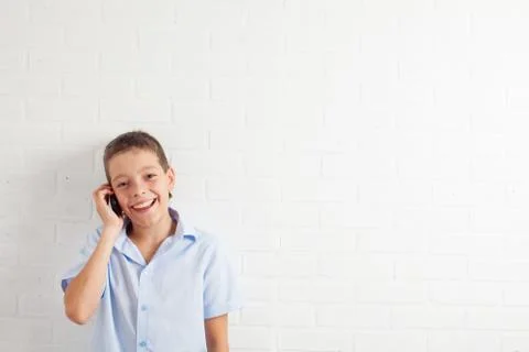 Boy talking phone Stock Photos