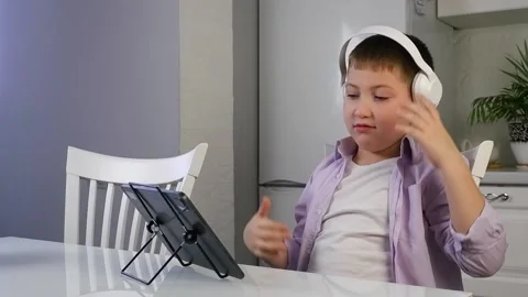 Boy is talking by video link. Stock Footage 167910213
