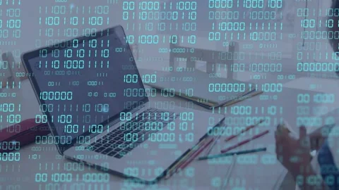 Boy tapping device, activating cyan binary overlay, laptop sitting idle, Stock Footage 334703651