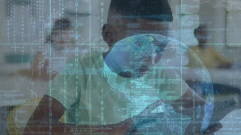 Boy tapping tablet in classroom, activating holographic globe and data streams Stock Footage 334760284