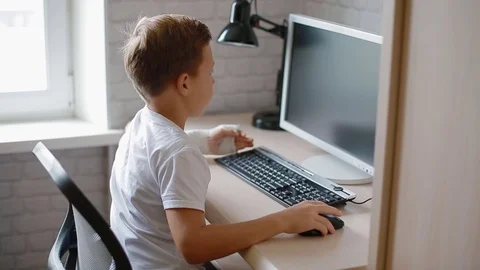Boy teaching how to use computer. Stock Footage 82859961