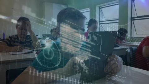 Boy in teal polo lifting tablet, animating overlay showing charts and code for Stock Footage 312897030