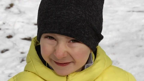 Boy is teasing and fooling on a camera. Close up. Boy is showing tongue Stock Footage 106716448