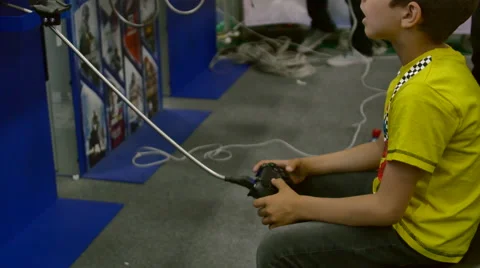 Boy Testing A New Video Game At Convention, ComicCon Stock Footage 64209084
