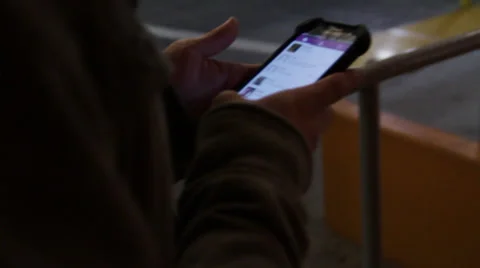 A boy texting in mobile and walk slowly Stock Footage 36173466