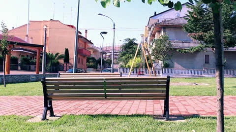 BOY THINKING ON THE BENCH Stock Footage 25679097