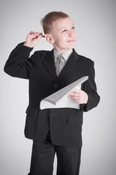 Boy with a thoughtful look Stock Photos