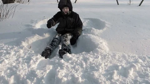 Boy throwing snow Stock Footage 237478928