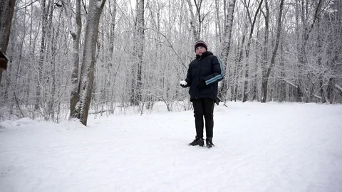 Boy throwing snowball Stock Footage 72102683