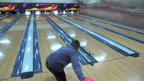 Boy throws ball in bowling. Stock Footage 75482113
