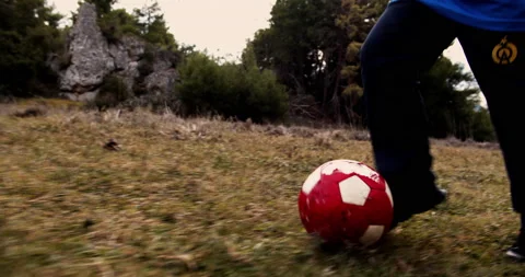 Boy throws the ball on the rural area and runs  動画素材 144009509