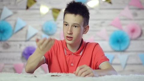 The boy throws coins in his hands. Stock Footage 109108644