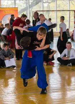 Boy throws his opponent through the thigh Stock Photos