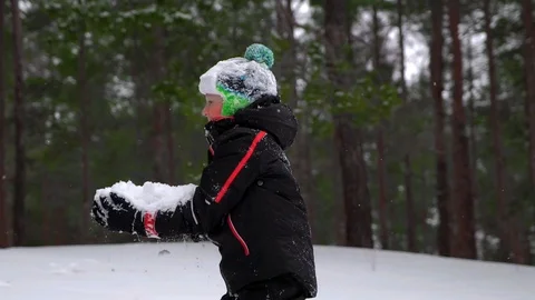 The boy throws snow  Video stock 88921457