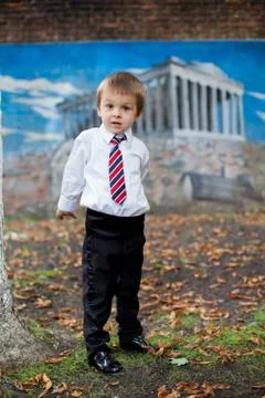 Boy with a tie, posing Stock Photos