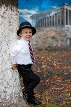 Boy with a tie, posing Stock Photos