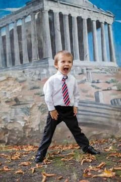 Boy with a tie, posing Stock Photos