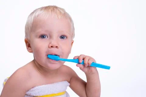 Boy with toothbrush Stock Photos
