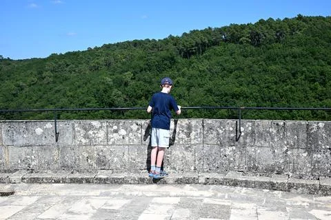 Boy at the top of a castle Stock Photos