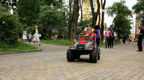 Boy in toy car Video stock 784452