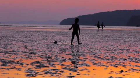 A boy with toy going along the beach Stock Footage 64213870