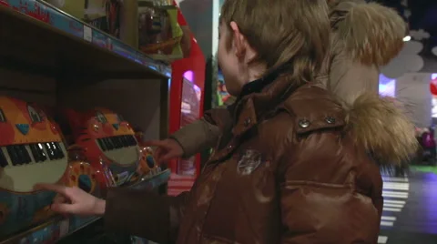 Boy in the toy store Stock Footage 55593899