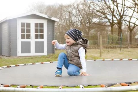 Boy on Trampoline Fotos de archivo