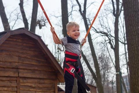 Boy on the trampoline Stock Photos