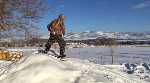 Boy trying a snow skate in winter HD  Stock-Footage 68687923