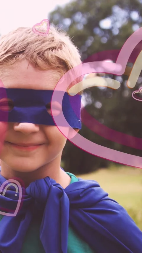 Boy turning to camera, smiling with blindfold in camp, camera moving forward, Stock Footage 332869228