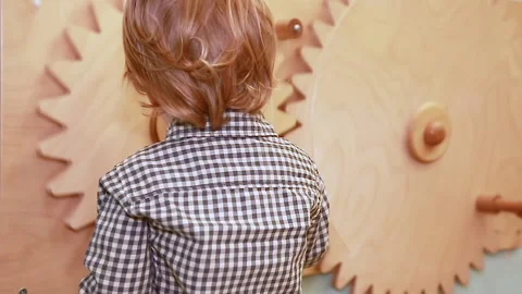 The boy turns the wheels Video stock 144780572