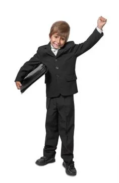 Boy in a tuxedo with a folder in hands. isolate on white background Stock Photos
