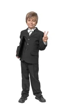Boy in a tuxedo with a folder in hands. isolate on white background Stock Photos