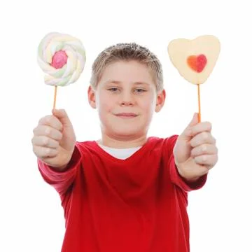 Boy with two lollipops Foto stock