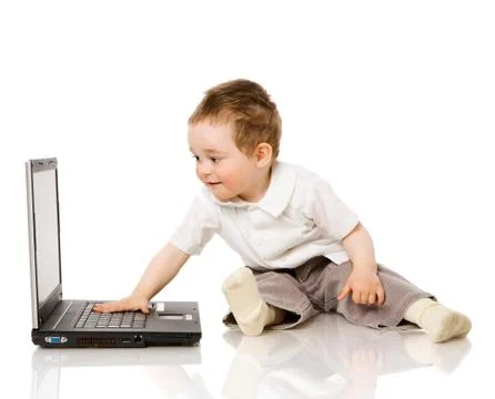 Boy typing Stock Photos