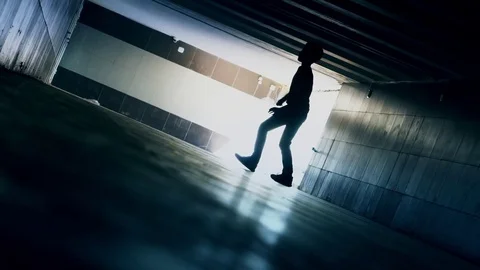 The Boy In The Underground Passage Plays With A Soccerball Stock Footage