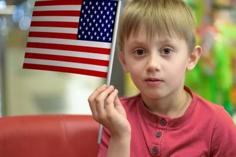 Boy with the USA flag Stock-Fotos