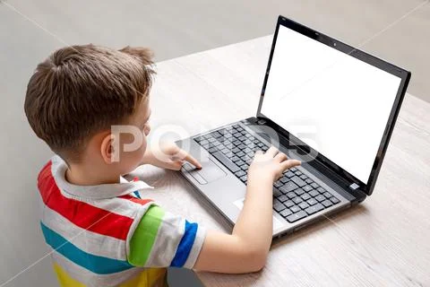 Boy use a laptop computer mockup PSD Template