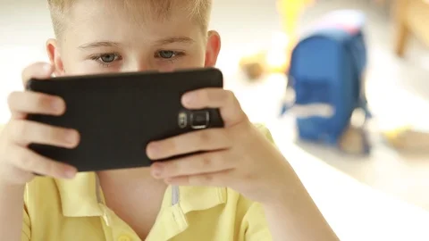   Boy use a mobile phone. Stock Footage 109417241