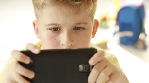  Boy use a mobile phone. Stock Footage 109417253