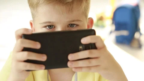   Boy use a mobile phone. Stock Footage 109417264