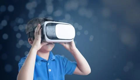 Boy use virtual reality headset. Concept futuristic abstract circles. Blue ba Foto stock