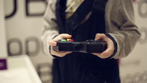 The boy uses the remote control Stock Footage 71480108