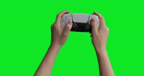 Boy uses a Sony PS5 DualSense wireless controller to play games on PlayStation Stock Footage 147317439